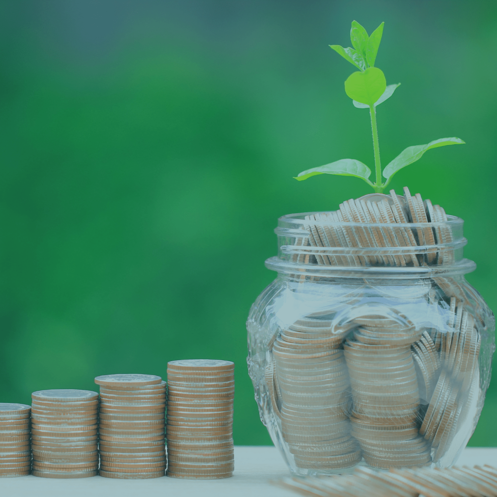 A picture of stacked silver and brown coins and a jar filled with coins that has a green plant growing inside the jar.