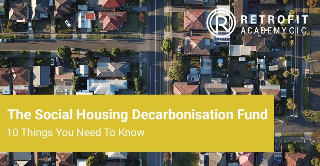 A post with a bird's eye view of a photo of a village and a yellow box with text that reads " The social housing decarbonisation fund, 10 things you need to know" in white text and the Retrofit Academy logo.