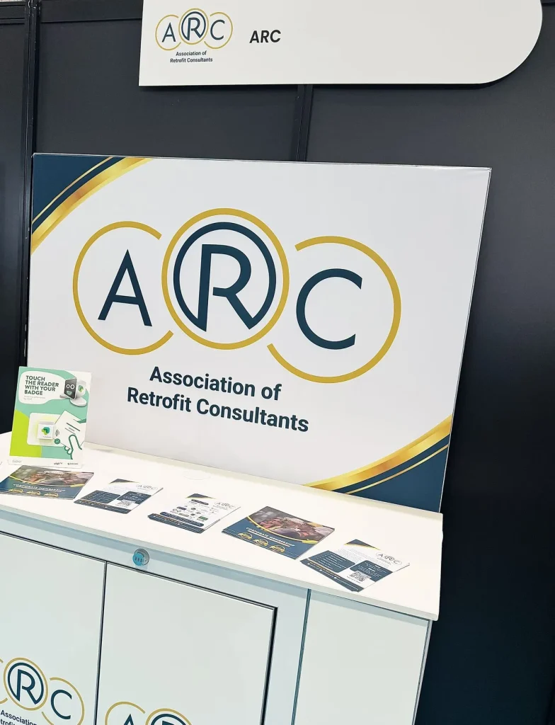 ARC Launch drinks at Futurebuild event - a cabinate with ARC logo backdrop and drinks counter.